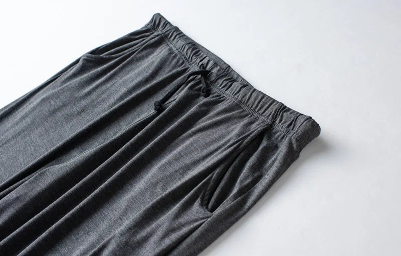 Men's spring and summer new modal pajamas two-piece short-sleeved trousers thin large size loose sports home wear suit sleepwear